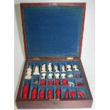 A fine 19th century English ivory chess set of John Barleycorn type, natural and stained red,