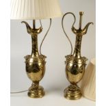 A pair of impressive Aesthetic Movement brass table lamps of ewer form.