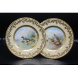 A pair of Minton plates painted by A.