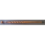 An African hardwood, spiral twist, tapering walking cane, length 90cm.