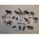 A collection of lead figures and animals including fox hunting.