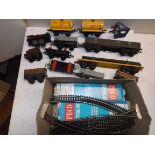 A collection of Hornby '0' gauge rolling stock, together with some 00 gauge track.