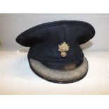 An officers cap by Edward Smith, Bond St.