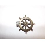 "Trenchart" a brass ship's wheel "1913 S.