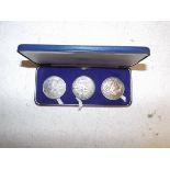 Three sterling silver medallions for the 1972 Olympics, cased.