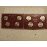 Two German 1972 Olympic coin sets in plastic case.