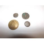 Two facsimile American coins and two Roman.