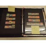 A stockbook containing miscellaneous stamps including Antigua,