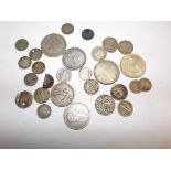 A collection of mainly silver world coins.