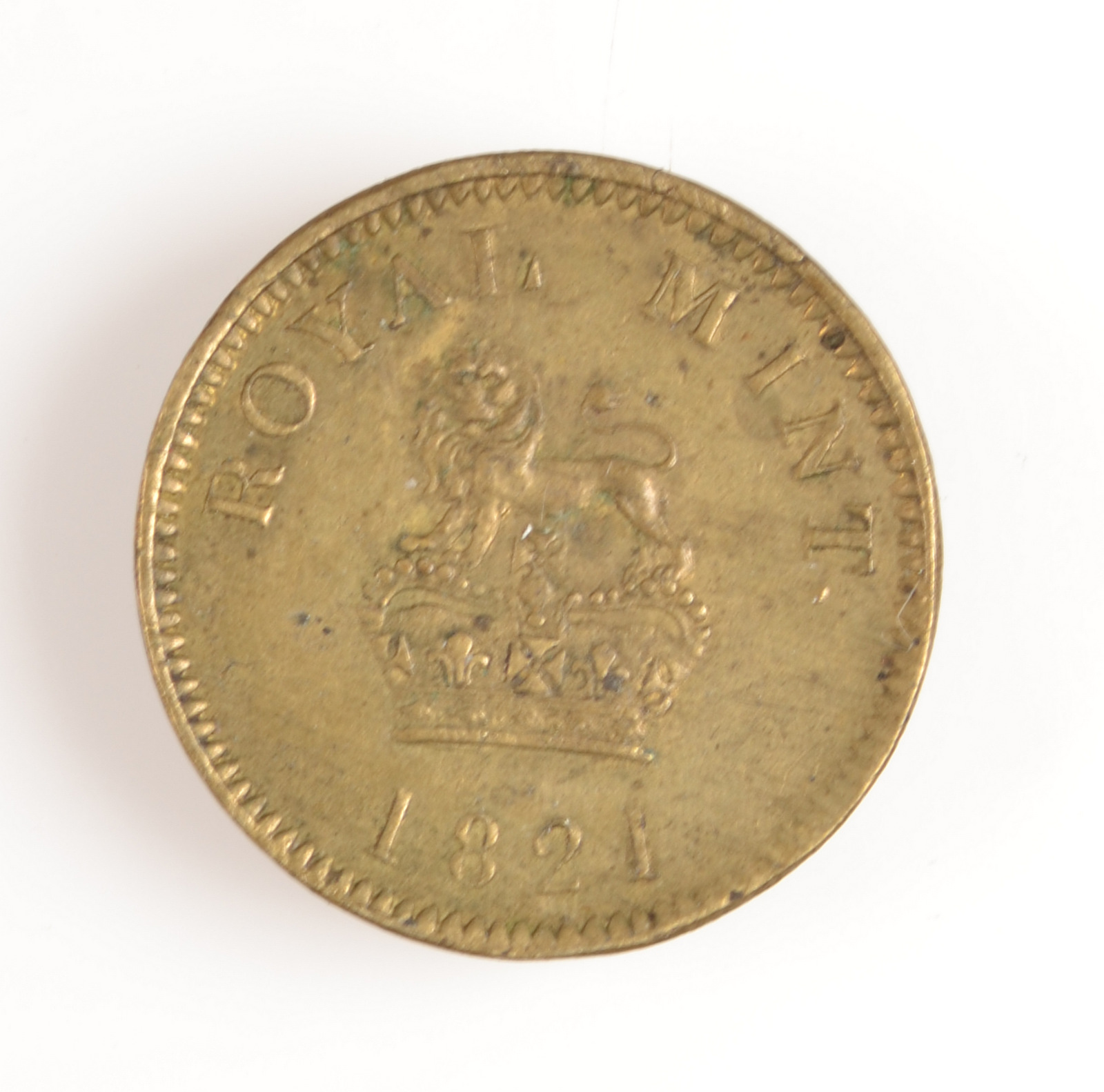 A coin weight:- "Royal Mint 1821","CUR weight 5/2 1/2d sovereign.