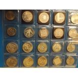 Sixteen various, mainly silver coins most Olympic related, together with four others.