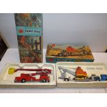 Corgi:- 1127 fire engine and no 27 machinery carrier each play-worn and in original box (a/f).