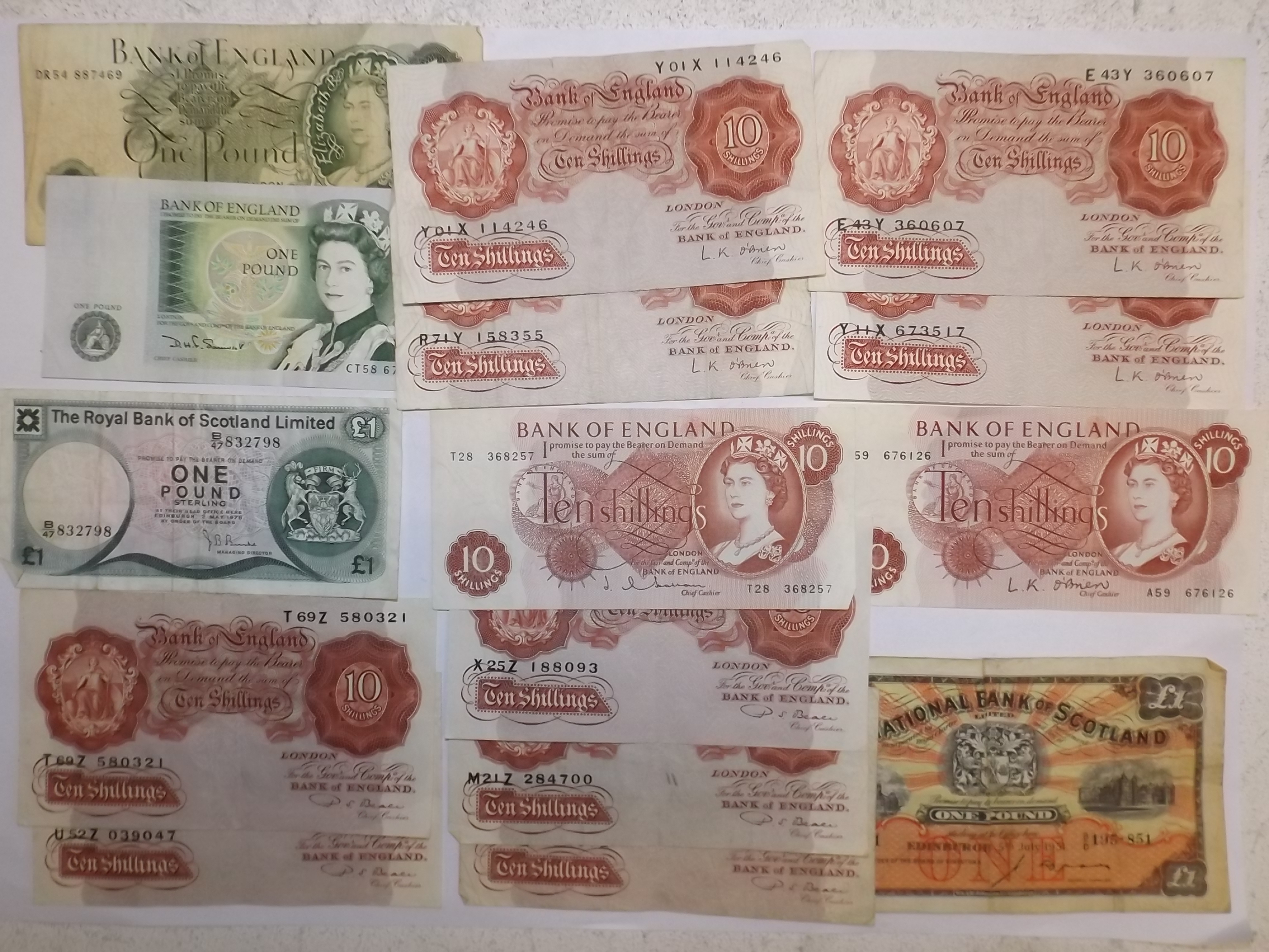 Banknotes:- 11 x 10/- 2x £1 together with Bank of Scotland 2x £1 including 5th July 1951.