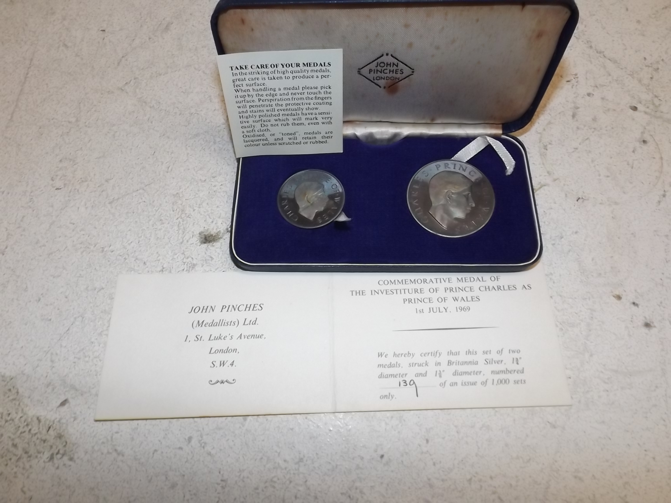 Prince Charles Investiture. Two Britannia standard silver medallions by John Pinches, original case.