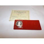 A 1969 Prince Charles Investiture Britannia standard silver medallion, with certificate.