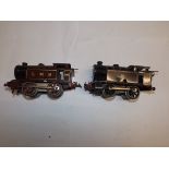 Two '0' gauge Hornby tin plate reversing locomotives.