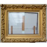 An ornate 19th century gilt picture frame Internal dimensions 46 x 61cm