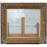 An ornate gilt frame Internal measurements 42.1 x 52.