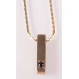 A 9ct gold sapphire set pendant on 9ct gold chain. 5.8g.