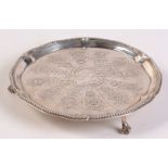 A George III silver waiter with beaded border,