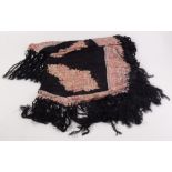 A black lace and paisley fringed shawl, 90 x 107cm.