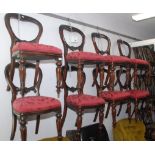 A set of eight mahogany balloon back dining chairs,