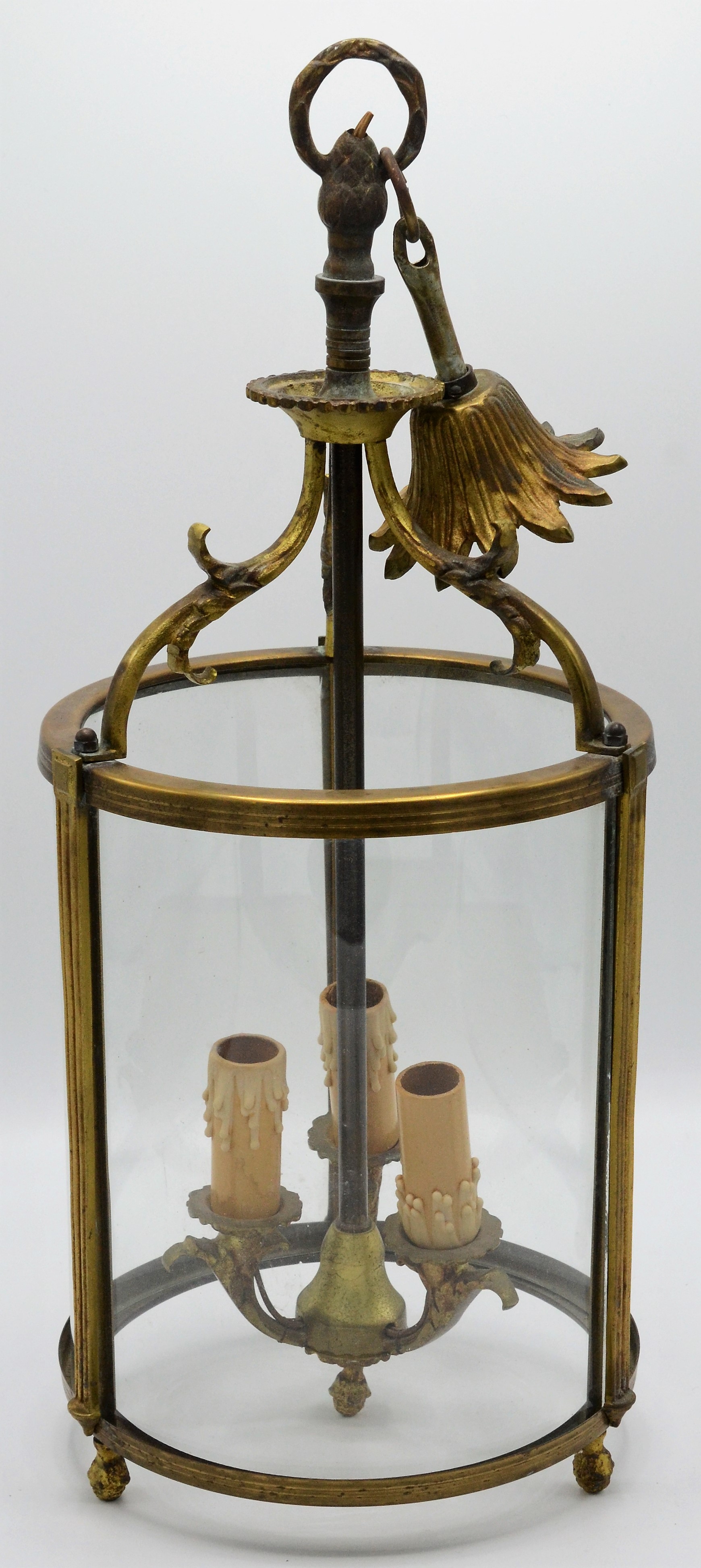 A George III style cylindrical brass hall lantern, with three glazed panels, total height 48cm.