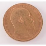 An Edward VII sovereign dated 1906, very fine.