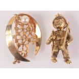 A 9ct gold chimney sweep charm, a pearl set gold brooch, 12.5g.