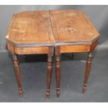 A pair of Regency mahogany card tables, each fold top with canted corners,