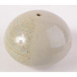 A possibly South East Asian celadon glaze water dropper of rounded form, height 7cm, diameter 9.5cm.