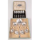 A cased set of six 1930s coffee spoons and a boxed set of dessert spoons.