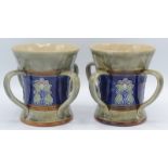 Two Royal Doulton tygs, by Florrie Jones, each decorated with stylised flowers,