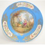 A "Sevres" porcelain plate decorated with a couple at a well,