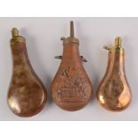 Three copper and brass military powder flasks,