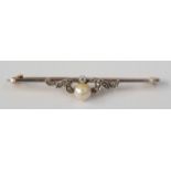 A diamond and pearl 15ct gold bar brooch in Hancock's box.