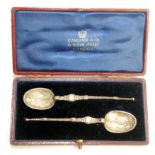 A pair of silver gilt miniature copies of the anointing spoon made for the coronation of Edward VII.