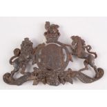 A cast iron coat of arms plaque, 19th century, length 19cm.