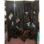 A Japanese black lacquered and painted screen,