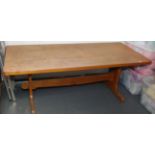 A 1960s elm refectory table on shaped supports 188 x 81cm.