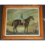 An oil on canvas of a racing horse and jockey signed S.