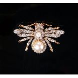 A fine late Victorian gold bumble bee brooch, the abdomen a pearl and diamond cluster,