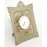 A early 20th century brass timepiece, the 8.