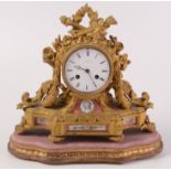 A French porcelain mounted ormolu mantel clock, 19th century,