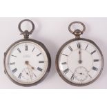 Two silver cased keyless open faced pocket watches.