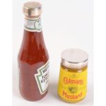 A Heinz ketchup bottle and a Coleman's mustard bottle,