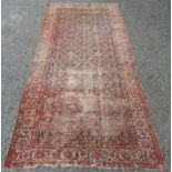 A Feraghan Kelleh carpet, the black and indigo abrash field with the all over Herati pattern,