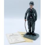 A Royal Doulton porcelain figure of Charlie Chaplin, HN 2771, with certificate.