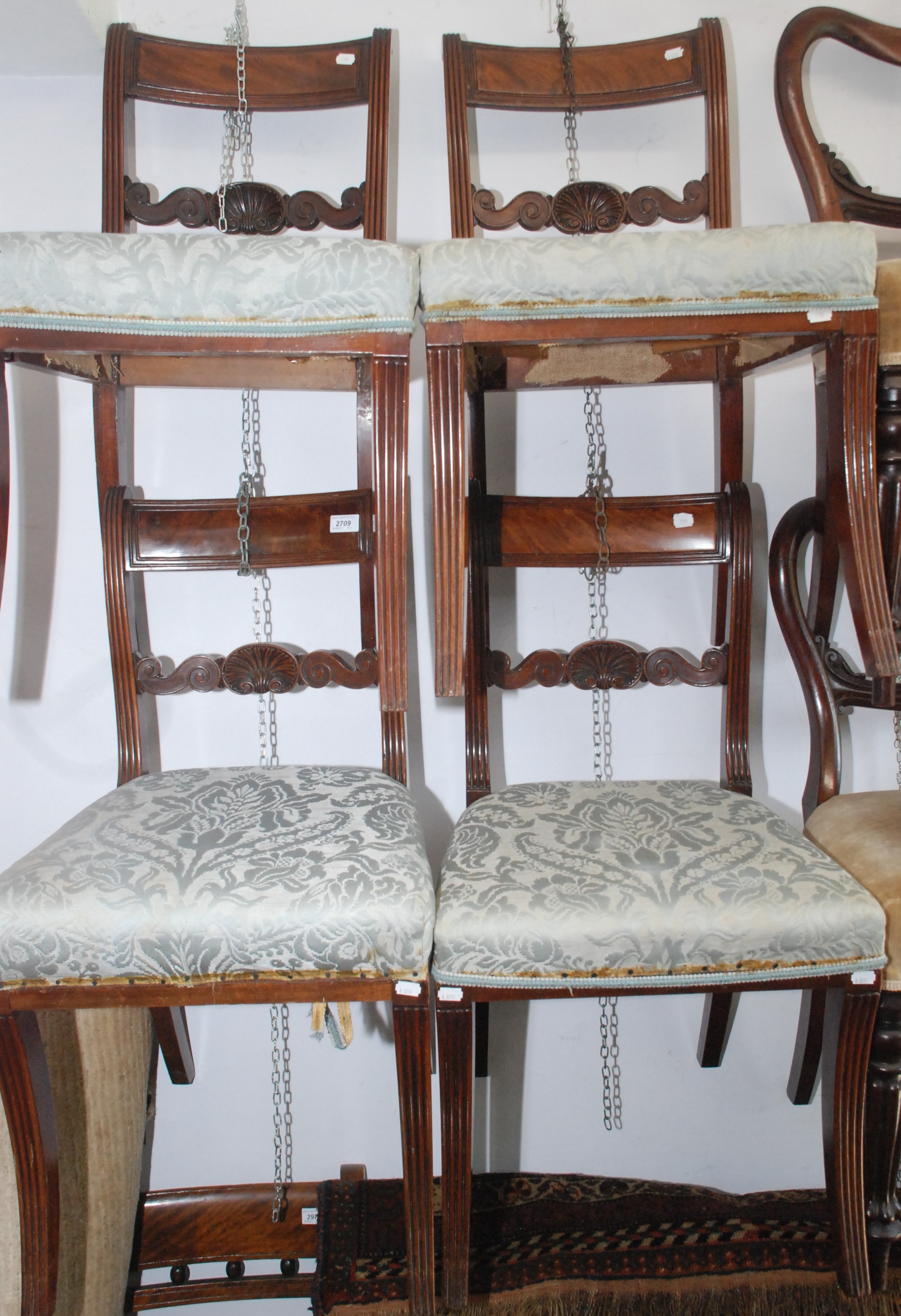 A set of four Regency mahogany dining chairs,