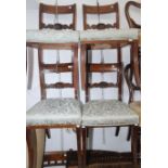 A set of four Regency mahogany dining chairs,